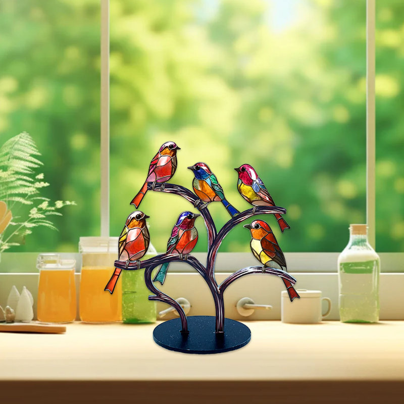 Figurine d'oiseau en acrylique sur une branche