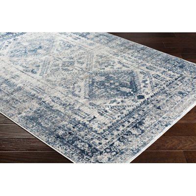 Tapis oriental bleu ciel tissé au métier mécanique Fitz