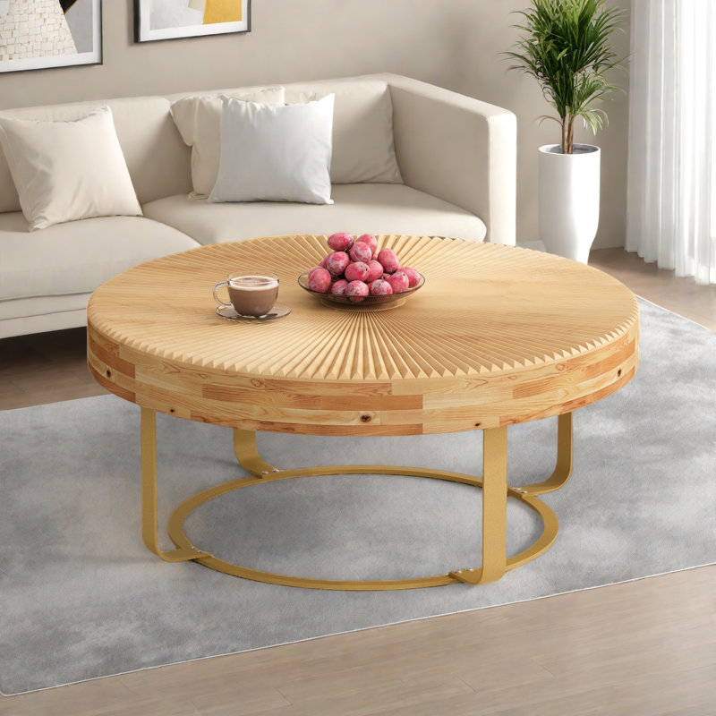 Table basse ronde moderne avec motif sculpté et pieds en métal, Or
