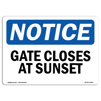 Gate Closes At Sunset Sign