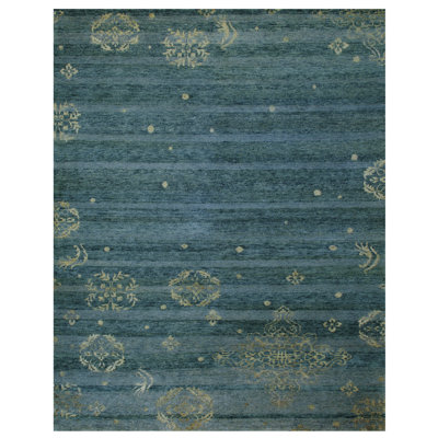 Tapis bleu sarcelle en laine Elivia