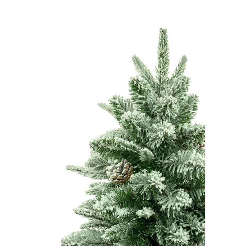 Faux arbre vert foncé recouvert de neige