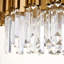 Lustre à niveaux unique / remarquable à 9 lumières avec accents de cristal Mamuna