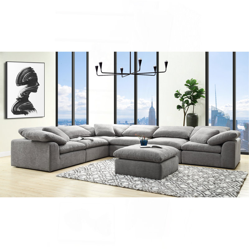Canapé modulaire en lin gris avec repose-pieds