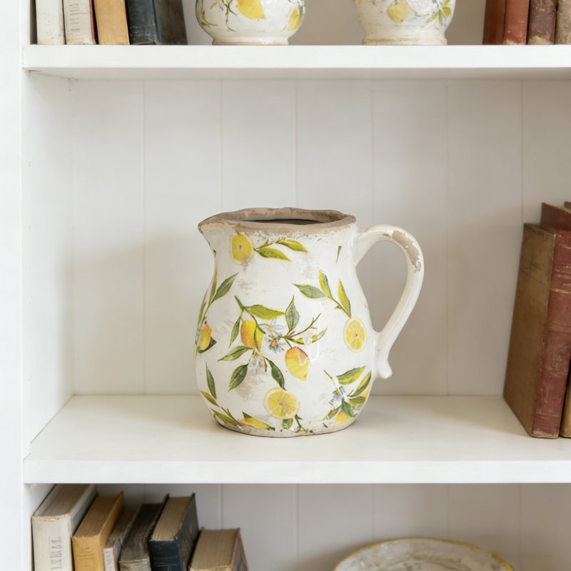Vase en céramique blanc avec motif jaune citron