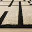 Tapis beige / noir Hennings-374813936