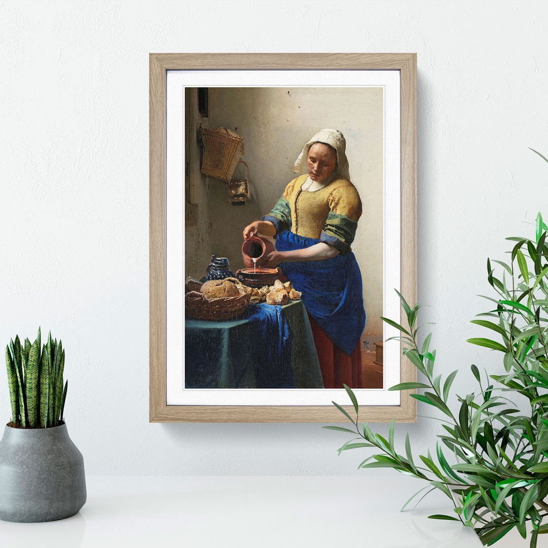 The Milkmaid by Johannes Vermeer - Framed Print