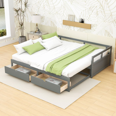 Dzeisonas Twin Size Wooden Daybed with Trundle and Two Storage Drawers by Harriet Bee