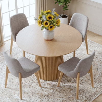 Jelks 4 - Person Round Solid Wood Dining Table Set