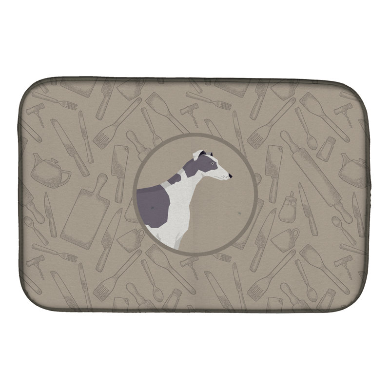 Tapis de séchage akita dans le tapis de cuisine, Lévrier