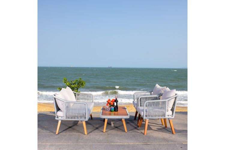 Falmouth eucalyptus four-person sofa set on beach-side patio.