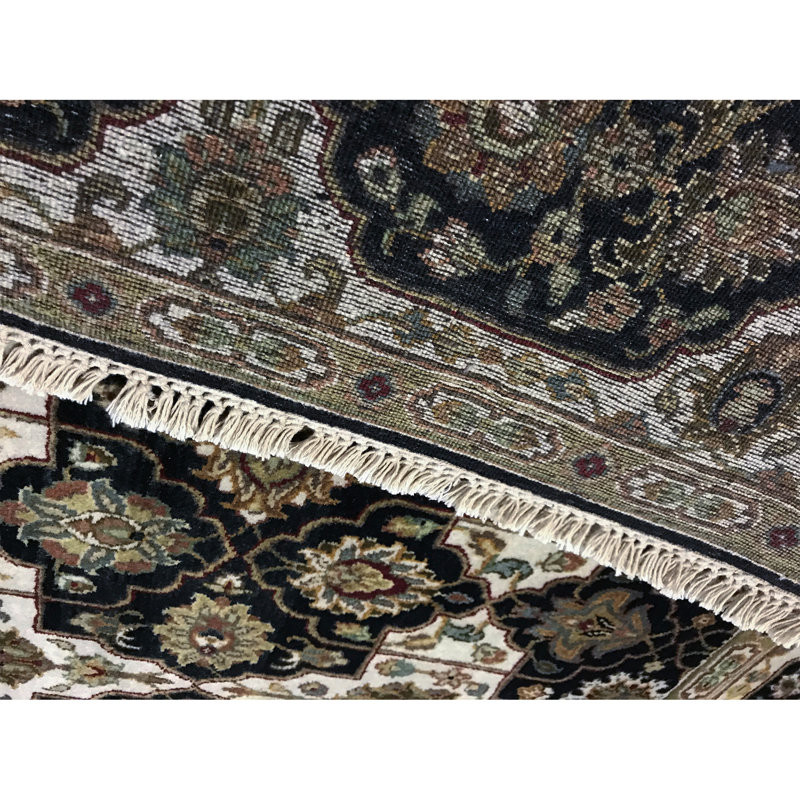 Lamani Wool Oriental Area Rug in Ivory/Black/Green