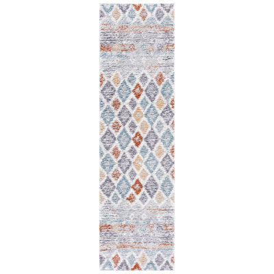 Tapis bleu rouille / ivoire Evangelyn