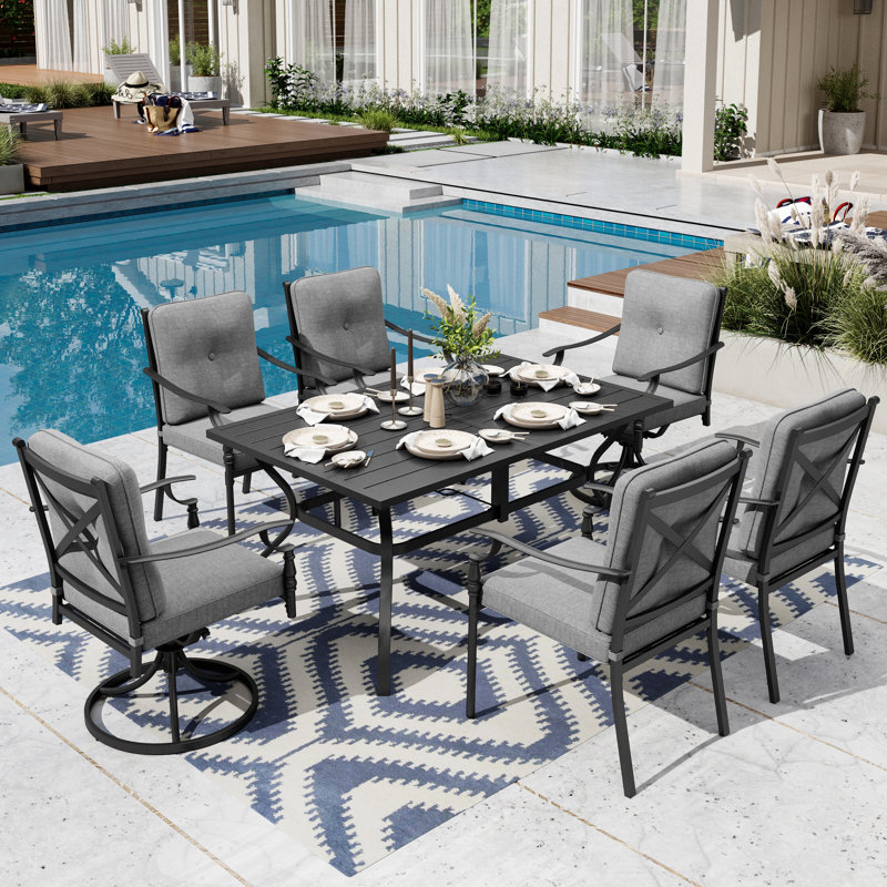 Ensemble repas extérieur pour 6 personnes avec chaises pivotantes et coussins
