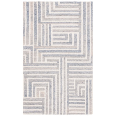Tapis rayé bleu / ivoire en laine / coton touffeté à la main Nedin