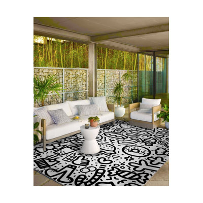 Tapis noir lavable à motifs géométriques à motifs géométriques