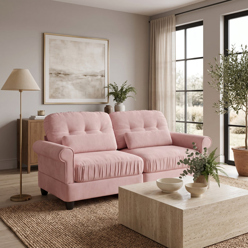 Canapé modulaire 2 places en chenille rose, avec coussins à bords volantés, dossier capitonné, accoudoirs arrondis et coussins lombaires.