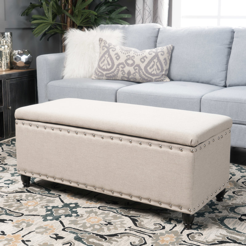 Banc avec repose-pieds en tissu couleur blé - siège élégant avec compartiment caché, Blé