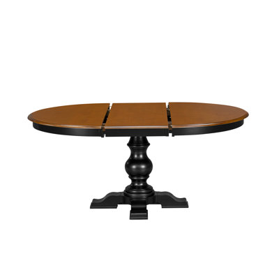 E3FCE302422A4721B351EFA9A58E04C1 – A Wooden Dinner Table with an Oval Cherry Tabletop, Butterfly Leaf & Black Finish