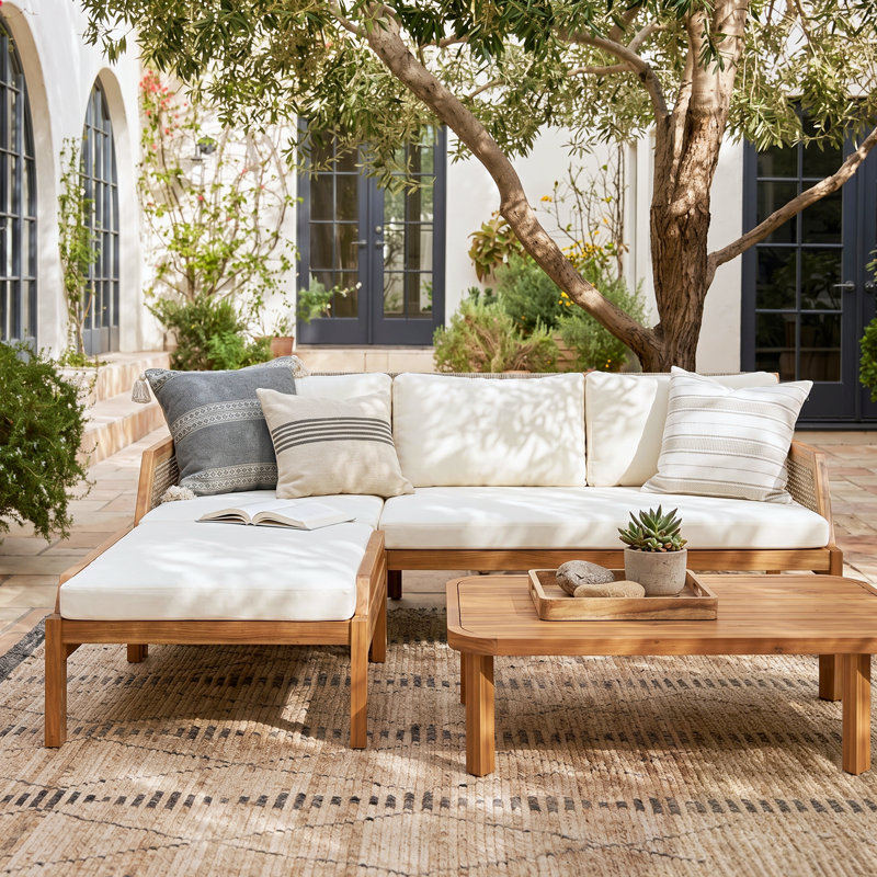 Ensemble de canapé modulaire d'extérieur en bois d'acacia Tressa avec table basse et repose-pieds, siège profond avec coussins hydrofuges