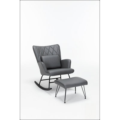 Fauteuil à bascule confortable à dossier haut pour chambre d'enfant, idéal pour la détente et les moments de complicité parent-enfant.
