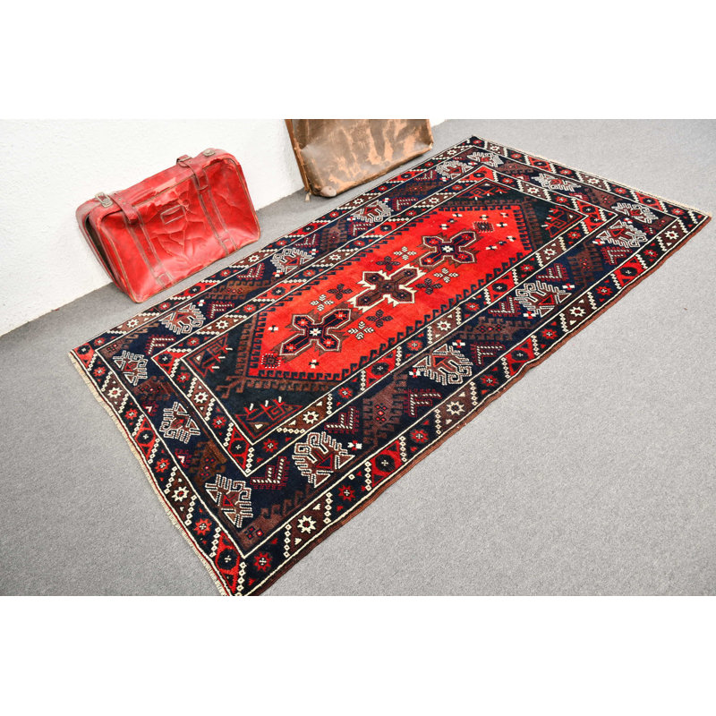 Authentique tapis turc fait à la main avec un motif géométrique rouge et brun pour une touche orientale élégante à votre décor de plancher