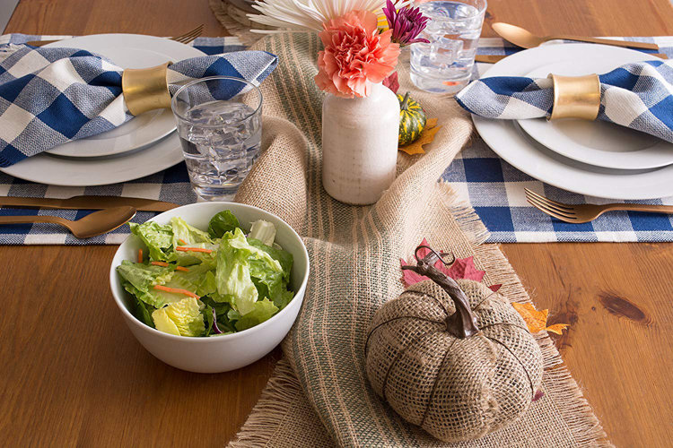 Table setting with burlap table runner and burlap pumpkin decor