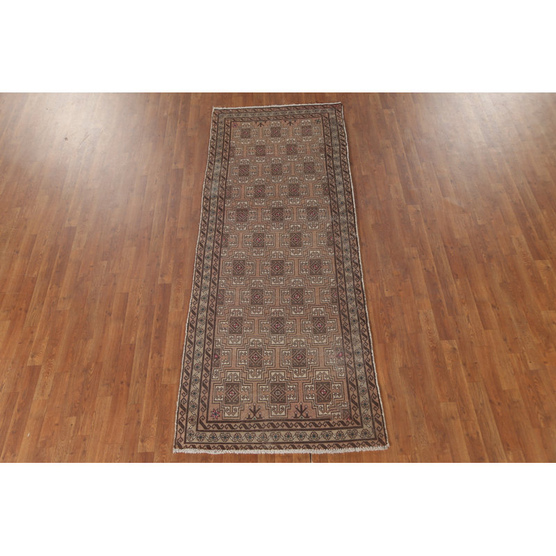 Tapis à motif géométrique 3x9
