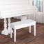 Banc de piano en blanc, rembourré de similicuir et cadre en bois pour duos