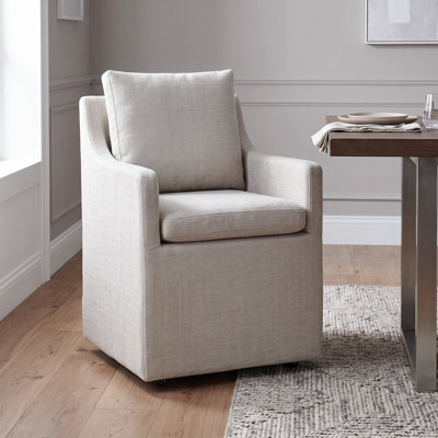 Hidar Upholstered Dining Armchair with Casters