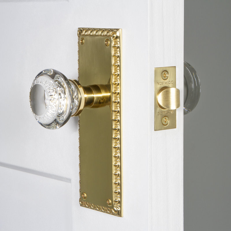 Nostalgic Warehouse Neoclassical Plate Passage (Hall & Closet) with Crystal Neoclassical Knob, 2.375", Unlacquered Brass