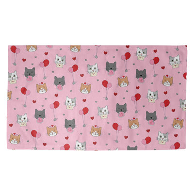 Tapis rose/rouge/beige fait main