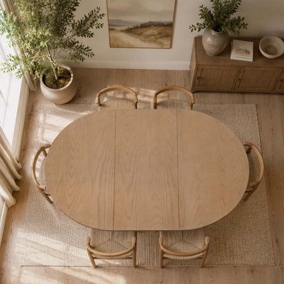Oval Extendable Dining Table with Natural Rustic Design and Elegant Pedestal Base for Cozy Gatherings