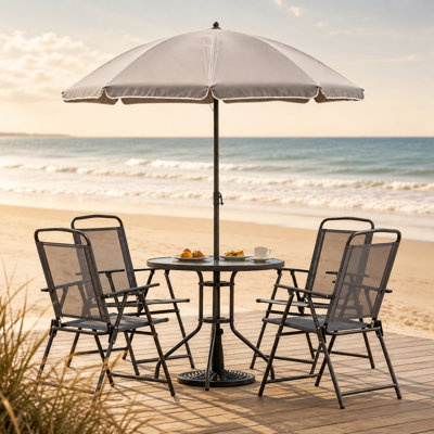Ensemble repas 6 pièces pour 4 personnes avec table en verre, chaises pliantes et parasol