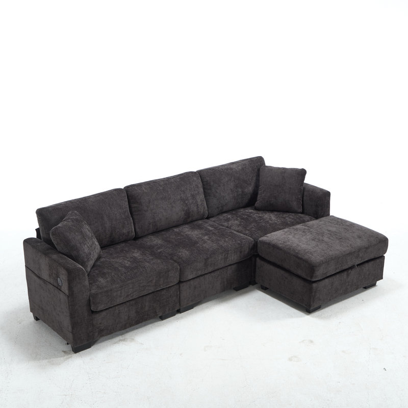 Canapé modulaire moderne en forme de L avec ports USB, repose-pieds de rangement et poches latérales pour une fonctionnalité de salon améliorée.