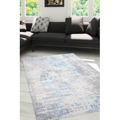 Tapis décoratif gris rayé