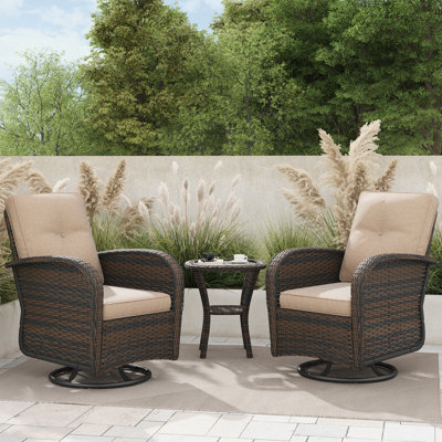 Ensemble de 3 chaises pivotantes en osier avec coussins et table d'appoint