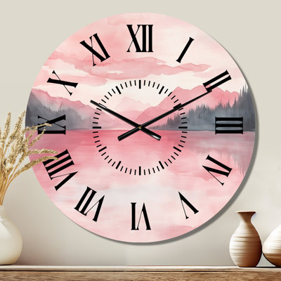 Horloge murale rose en métal avec lac