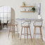 Tabouret de bar à hauteur fixe en bois blanchi et cuivre antique avec repose-pieds carré