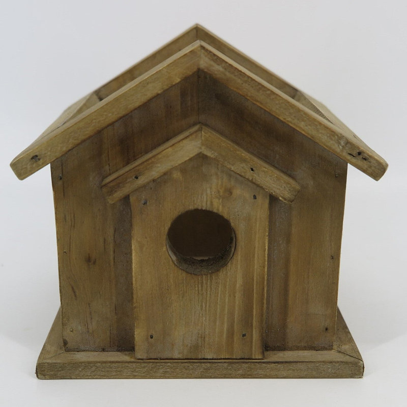 Maison d'oiseaux rustique en bois brun