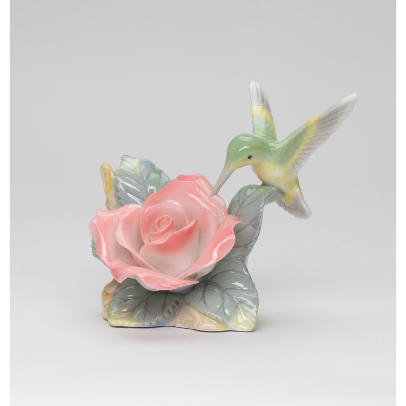 Figurine colibri avec rose de la paix