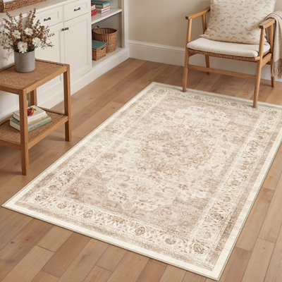 Tapis oriental beige Stella avec envers antidérapant