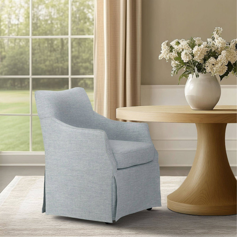 Chaise rembourrée avec accoudoirs et roulettes cachées, Bleu