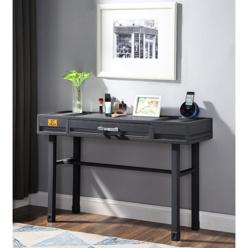 Coiffeuse en métal gris anthracite avec tiroir, pieds droits, plateau en fer, panneau encastré, butée latérale, fermeture manuelle du tiroir. Dimensions : 99 cm (L) x 41 cm (L) x 64 cm (H).