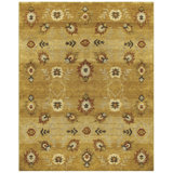 Amzad Wool Floral Area Rug in Gold/Rust