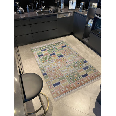 Tapis décoratif multicolore à motif floral frangé