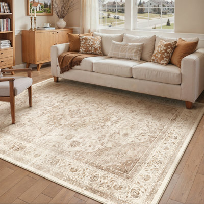 Tapis oriental beige Stella avec envers antidérapant et rouleau
