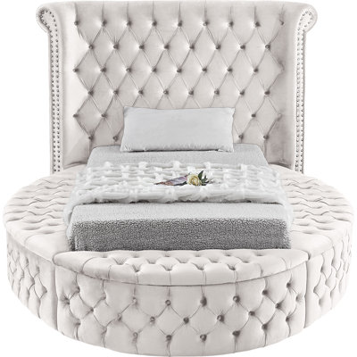 Dorgan Upholstered Wingback Bed
