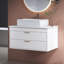 Meuble-lavabo moderne simple avec lavabo vasque en céramique et rangement spacieux, parfait pour les salles de bain contemporaines