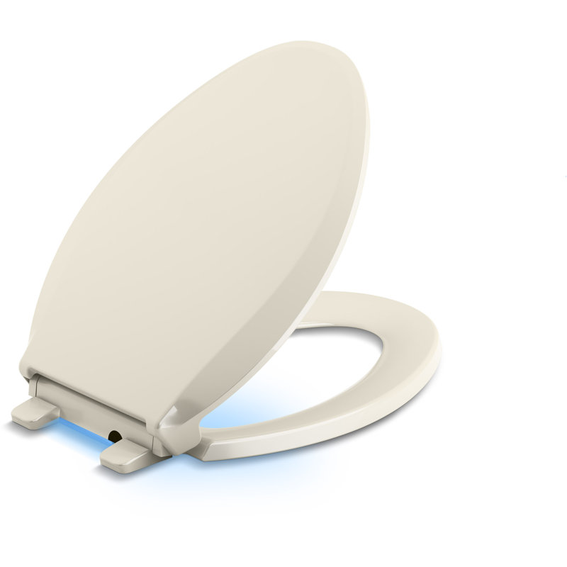 Cachet Nightlight Quiet-Close with Grip-Tight Elongated-Front Toilet Seat, Biscuit, Ready Latch